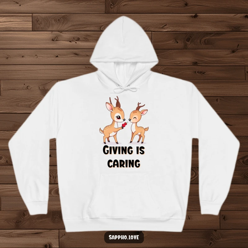 Funny hoodie showing a gentle deer with soft eyes offering a berry to another deer.